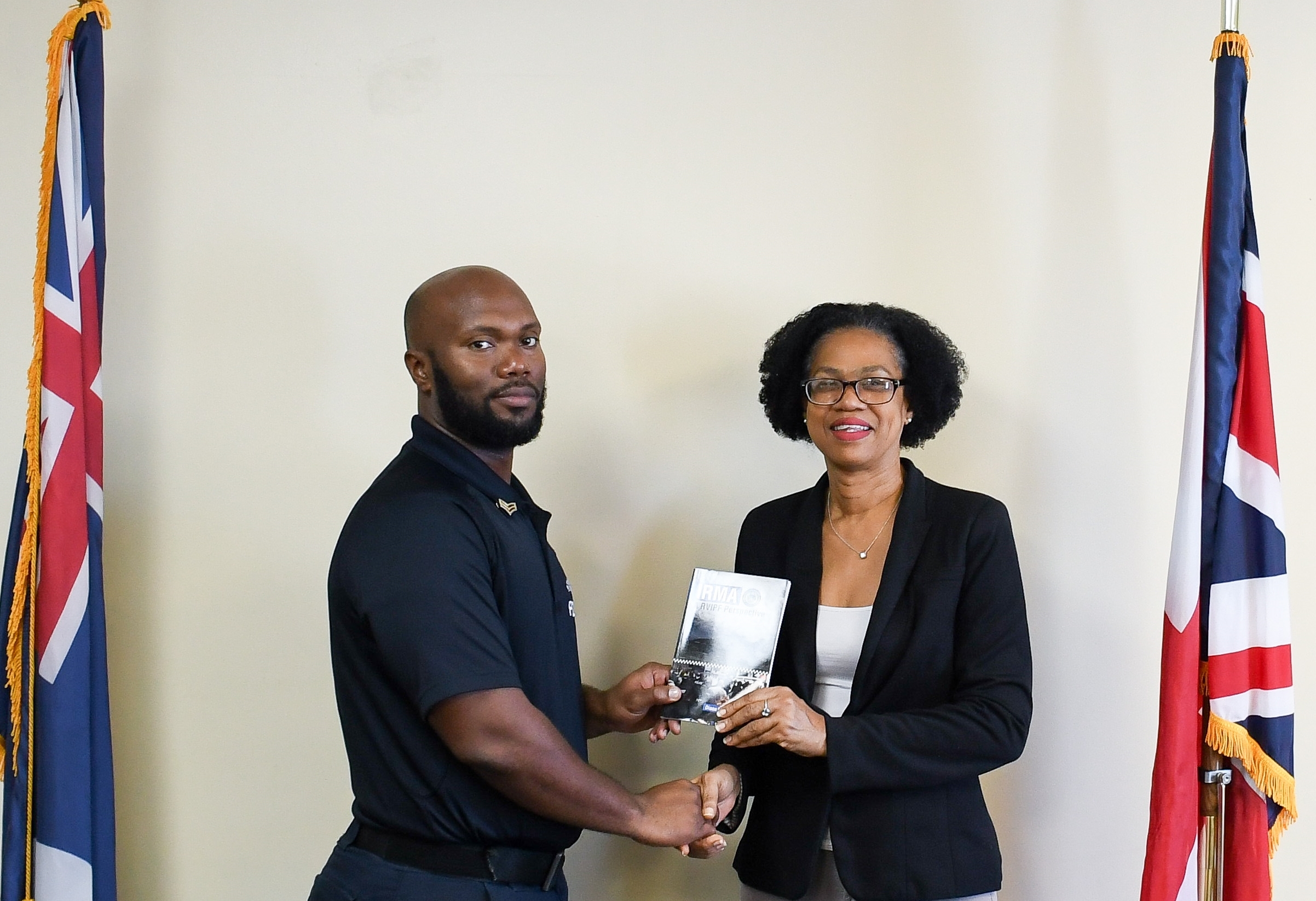 PS Maragh was also presented with a copy of the book