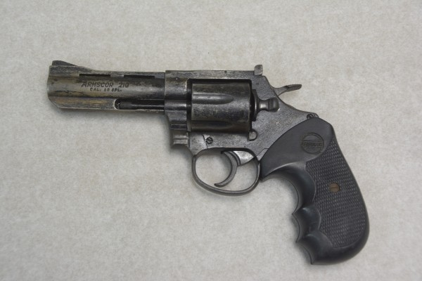 Photos: Police Operations in West Bay District Recover Loaded Firearm and Yield Two Arrests